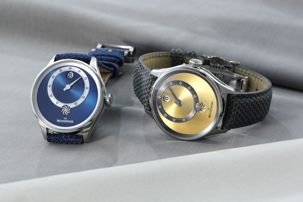 MeisterSinger Panthero Jumping Hour watches with blue and golden-yellow sunburst dials