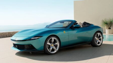 Ferrari Draws a Firm Line Against Fully Autonomous Cars Ferrari sports car steering wheel and cockpit focused on the driver
