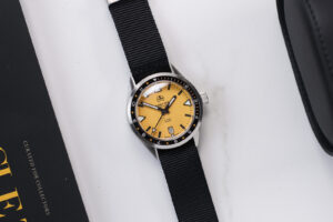 Ollech & Wajs C-1000 Y yellow dial dive watch on a black nylon strap