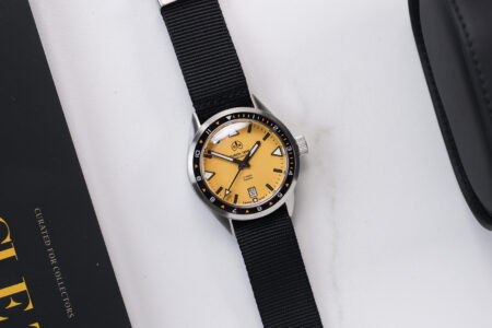 Ollech & Wajs C-1000 Y yellow dial dive watch on a black nylon strap