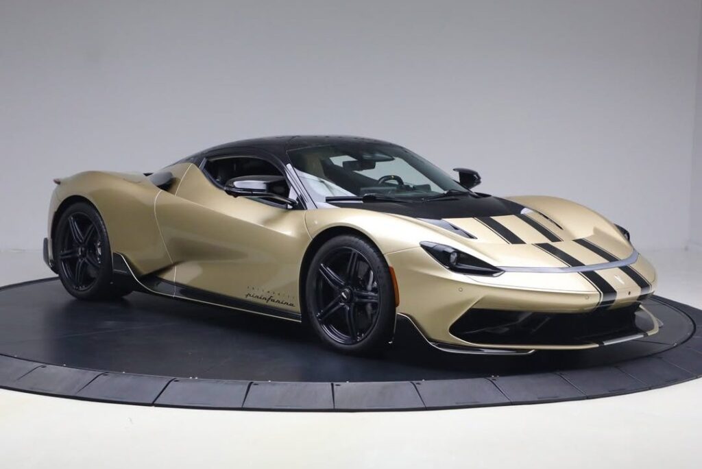 A 1,900 hp Pininfarina Battista With Seven-Figure Bespoke Upgrades Is Up for Sale Light gold Pininfarina Battista electric hypercar with black roof and racing stripes