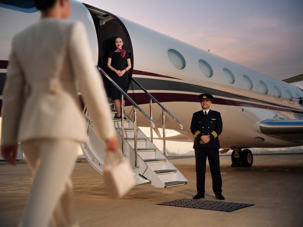 Qatar Executive private jet cabin with lounge seating and a calm luxury interior