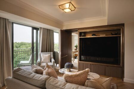 The Athenaeum Turns Its 10th Floor Into Mayfair Suites With Skyline Views A luxury Mayfair hotel suite with floor-to-ceiling windows overlooking Green Park and the London skyline