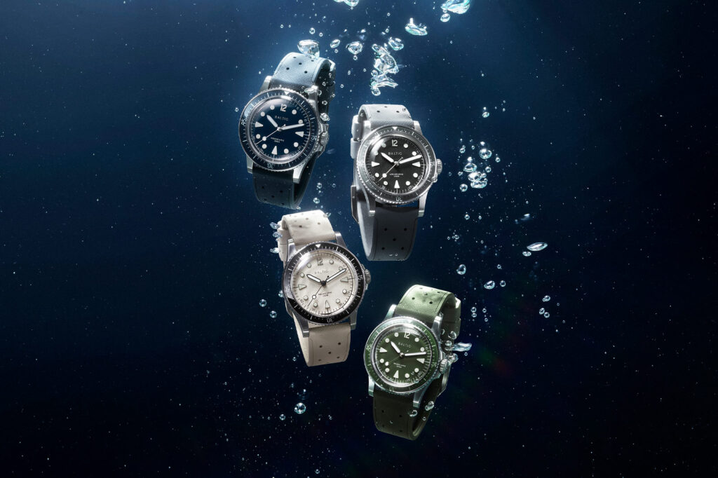 Selection of colourful skin diver watches arranged beside a swimming pool for summer wear