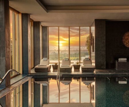 Victoria Golf Resort & Spa Brings Easy Algarve Luxury to Vilamoura Palm-lined pool at Victoria Golf Resort and Spa in Vilamoura, Portugal