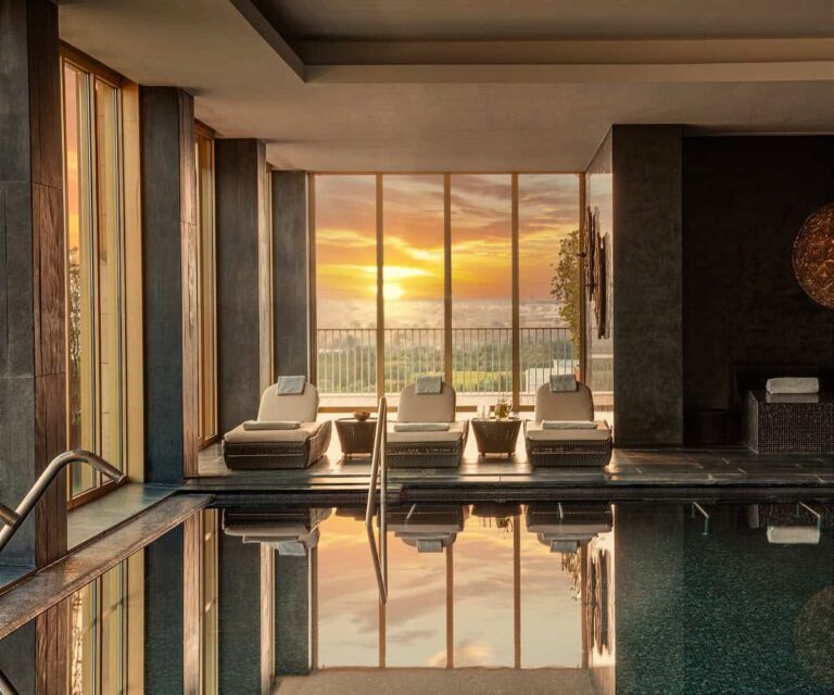 Victoria Golf Resort & Spa Brings Easy Algarve Luxury to Vilamoura Palm-lined pool at Victoria Golf Resort and Spa in Vilamoura, Portugal