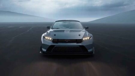 Ford Mustang on a road representing its 2026 sporty car quality award