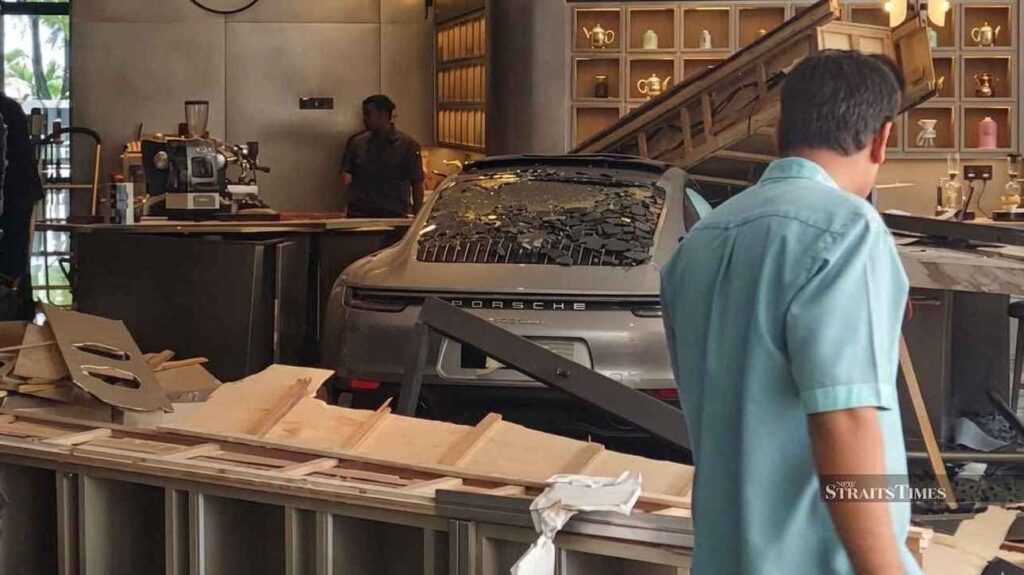 Porsche after crashing into a hotel lobby in Penang