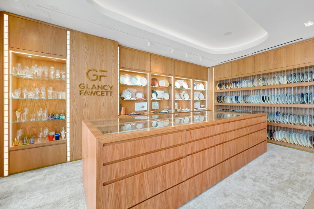Glancy Fawcett Opens a Fort Lauderdale Showroom for Yacht and Private Jet Interiors Glancy Fawcett Fort Lauderdale showroom at Pier Sixty-Six with luxury tableware and linens on display