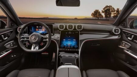 Europe’s New Safety Rules Bring Driver-Monitoring Cameras to Every New Car Modern car interior with a driver-monitoring camera near the steering column