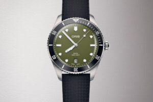 Oris Gives the Divers Date a Sharper Olive Green Dial Oris Divers Date Olive Green watch with stainless steel bracelet and black ceramic bezel