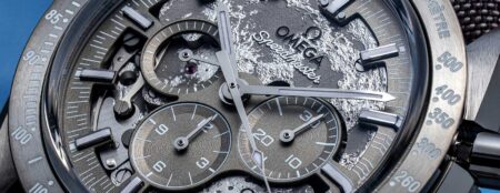 Omega Speedmaster chronograph shown with lunar surface inspired background