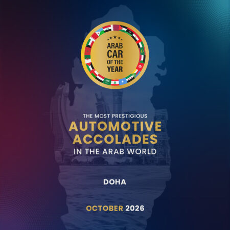 Doha prepares for Arab Car of the Year and the first Asia Car of the Year awards Luxury automotive awards gala setting in Doha with modern cars displayed under dramatic lighting