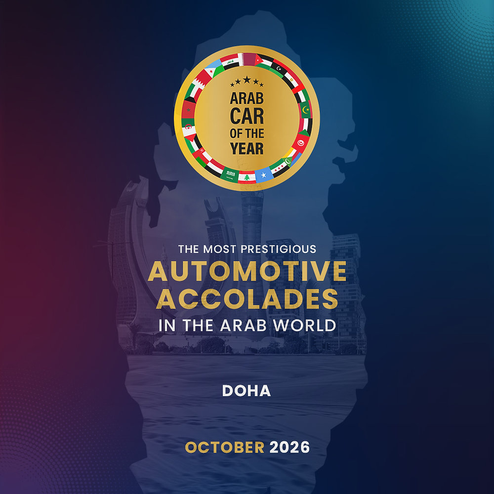 Luxury automotive awards gala setting in Doha with modern cars displayed under dramatic lighting