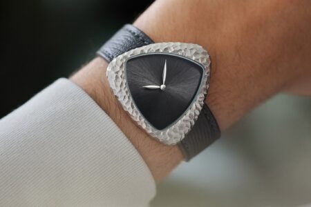 Anoma Gives the A1 a Hand-Chiselled Prehistoric Skin Anoma A1 Prehistoric watch with hand-chiselled stainless steel case and anthracite dial on grey leather strap