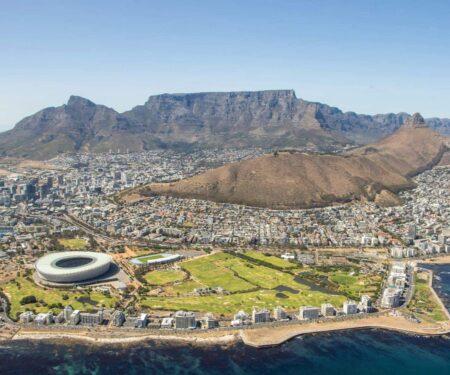 Cape Town Is the Winter Escape Europe Keeps Coming Back To Luxury villa pool overlooking the Atlantic Seaboard in Cape Town with mountains behind