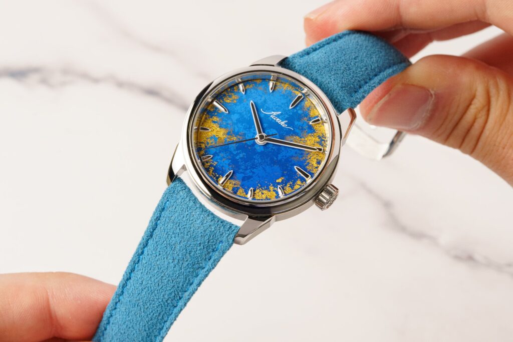 Awake Son Mai Frosted Leaf Royal Blue Brings Gold Leaf Into the Dial Awake Son Mai Frosted Leaf Royal Blue watch with blue lacquer and gold leaf dial