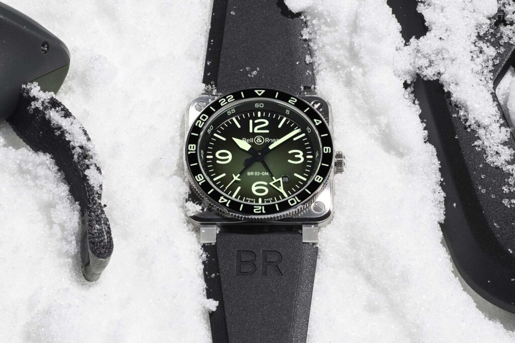 Bell & Ross Gives the BR-03 GMT a Green Lum Makeover Bell & Ross BR-03 GMT Green Lum watch with green gradient dial and black rubber strap