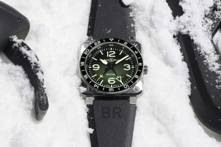 Bell & Ross BR-03 GMT Green Lum watch with green gradient dial and black rubber strap