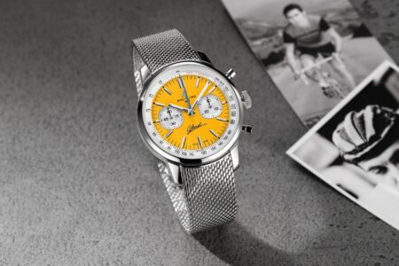 Breitling’s Top Time B01 Eddy Merckx Puts the Yellow Jersey on the Wrist Breitling Top Time B01 Eddy Merckx yellow dial chronograph on a stainless steel mesh bracelet