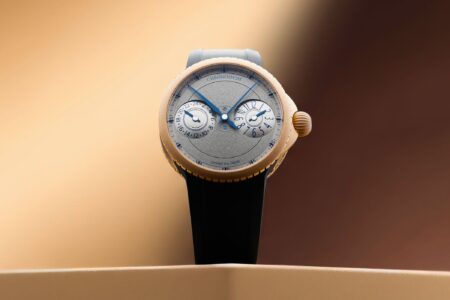 Chronoswiss Pulse GMT Frosted Guilloché Gold watch with frosted guilloché dial and black rubber strap