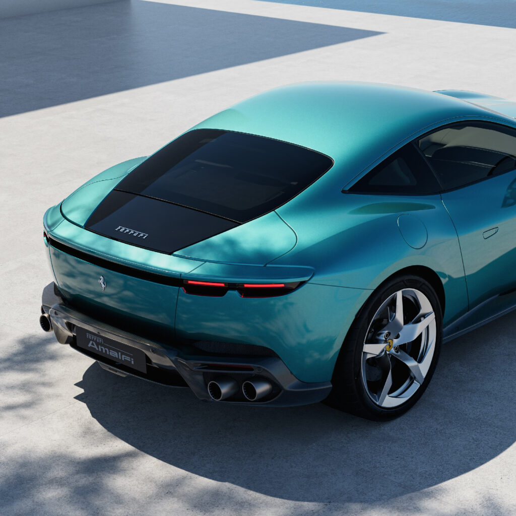 Ferrari Amalfi Brings Riviera Poise Back to the Grand Tourer Ferrari Amalfi grand tourer on a coastal road above Monaco