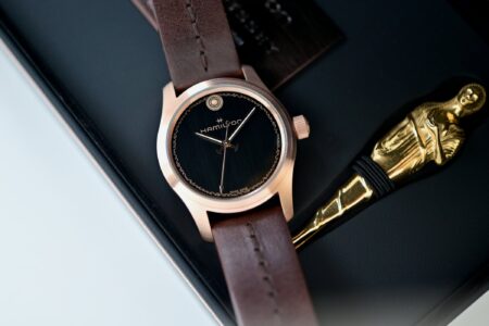 Hamilton Khaki Field Auto The Odyssey Limited Edition bronze watch with black textured dial and brown leather strap