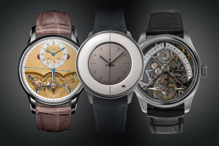 Selection of independent mechanical watches arranged on a dark editorial watchmaking bench
