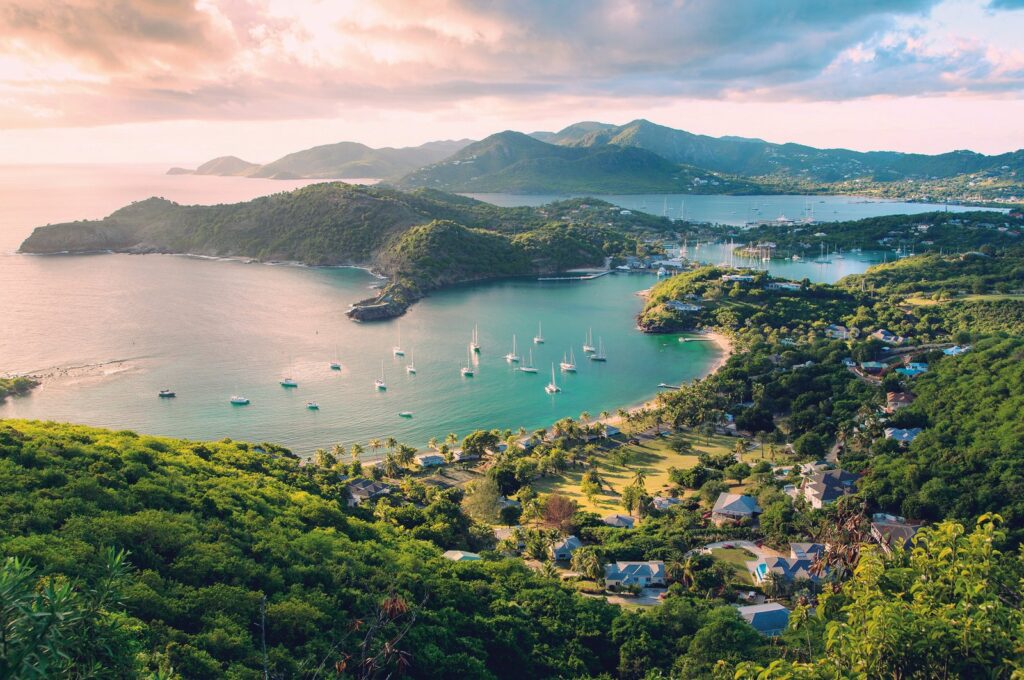 Antigua and Barbuda’s Citizenship by Investment Programme Looks Beyond Island Appeal Aerial view of turquoise water and coastline in Antigua and Barbuda
