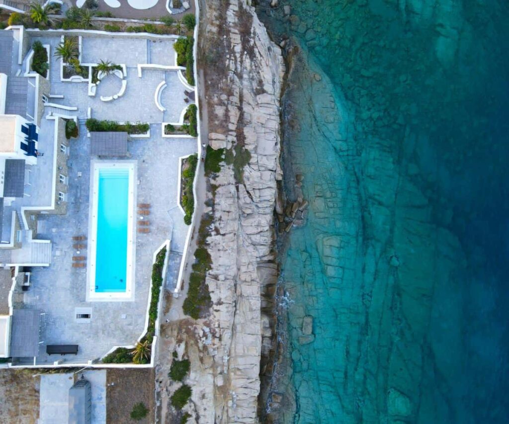 Luxury villa terrace with infinity pool overlooking the sea in Mykonos