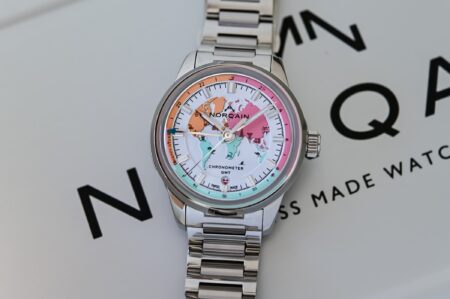 Norqain Freedom GMT Enjoy Life Holiday limited edition watch with colourful world map dial