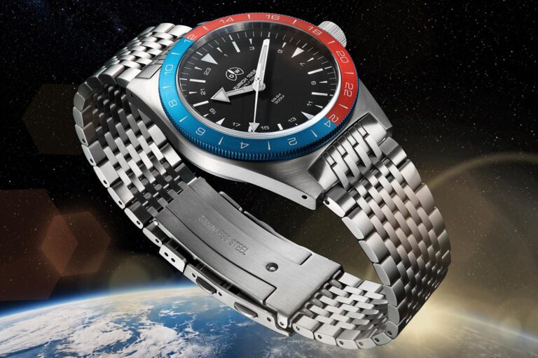 Ollech & Wajs Early Bird 24-hour dual time zone watch with red and blue bezel