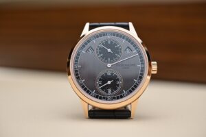 How Regulator and Retrograde Displays Rewired the Watch Dial A mechanical wristwatch dial with off-centre regulator-style hands and sub-dials