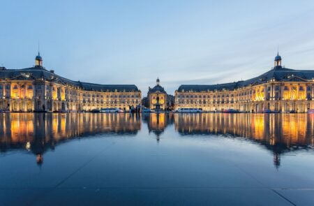 Bordeaux riverfront with Place de la Bourse and the Miroir d’Eau at golden hour