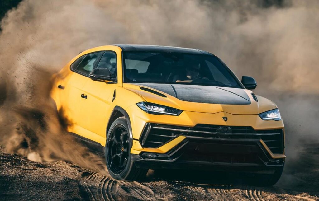 Lamborghini’s Next Urus Will Keep V8 Hybrid Power Lamborghini Urus driving on a mountain road