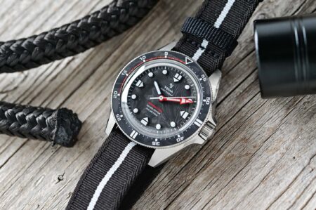 Yema’s Navygraf Barracuda Brings a Submarine Edge to the CMM.20 Diver Yema Navygraf Barracuda CMM.20 Limited Edition with forged carbon dial and red minute hand