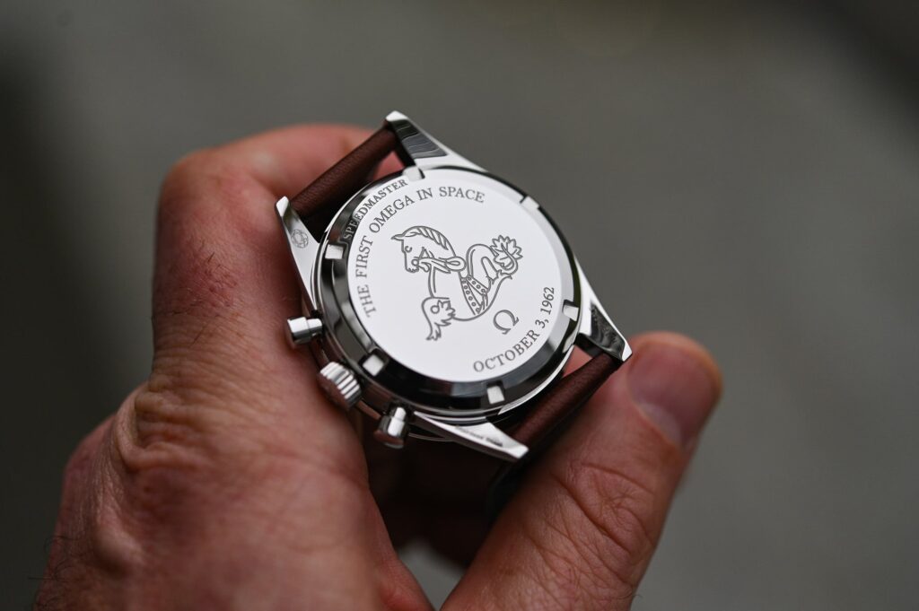 The hidden engineering behind watch casebacks Close-up of a mechanical watch caseback showing a sapphire display back and visible movement