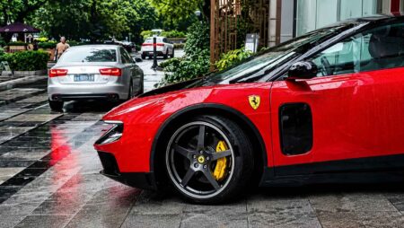 Ferrari Luce Reaches China as the Brand’s First EV Tests Its Pull Ferrari Luce EV in Rosso Fiammante displayed at a Guangzhou dealer