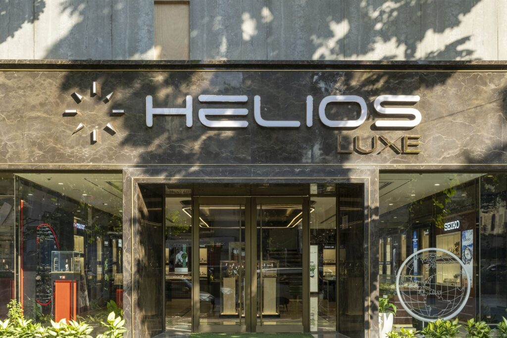 Helios Luxe luxury watch boutique interior in India with display cases and modern retail lighting