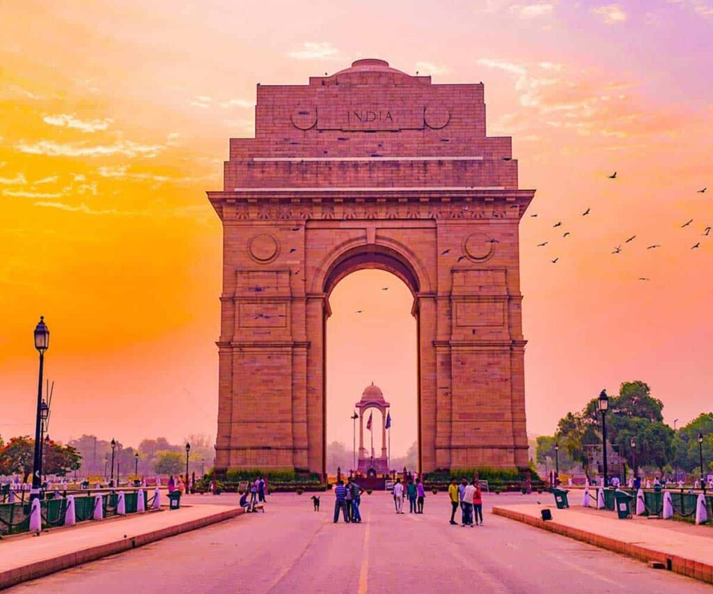 Three Luxury Delhi Hotels That Capture the Capital’s Many Moods Luxury hotel courtyard in New Delhi with elegant architecture and landscaped gardens