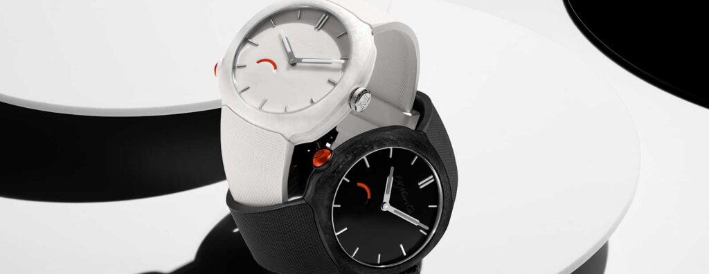 Moser Turns the Reebok Pump Into a Mechanical Streamliner H. Moser & Cie. Streamliner Pump watches in black and white with orange pump-style pushers