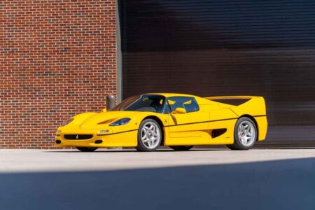 1996 Ferrari F50 in Giallo Modena yellow sold at Monterey auction
