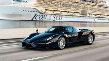 Black Ferrari Enzo with red leather interior at Monterey Car Week auction