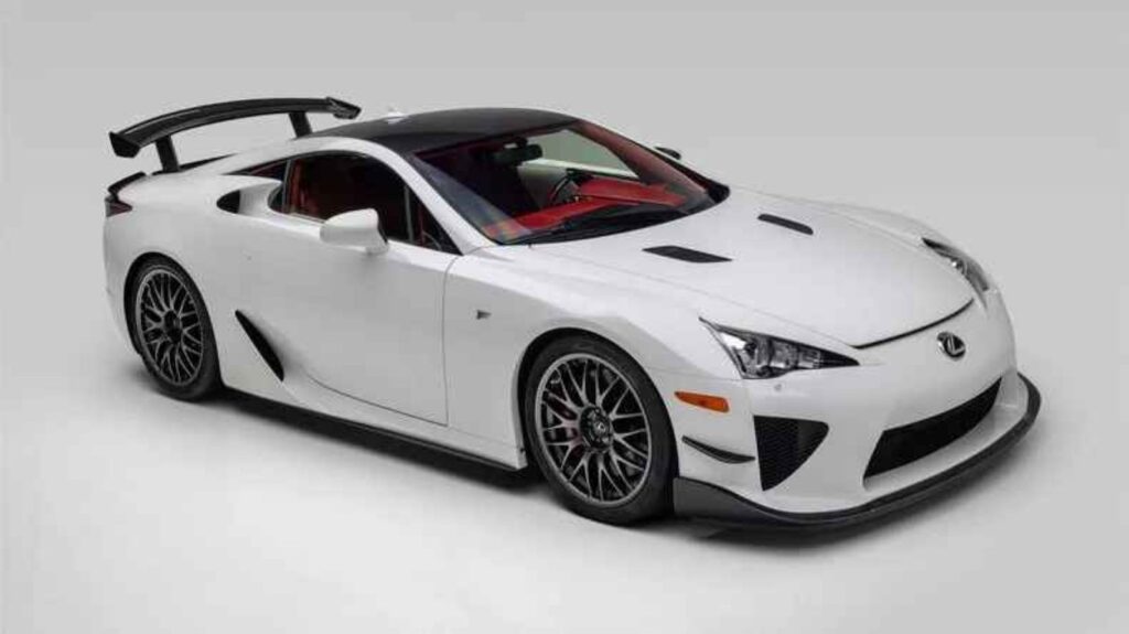 White Lexus LFA Nürburgring Package With 72 Miles Surfaces for Sale White Lexus LFA Nürburgring Package parked with fixed rear wing and track-focused bodywork