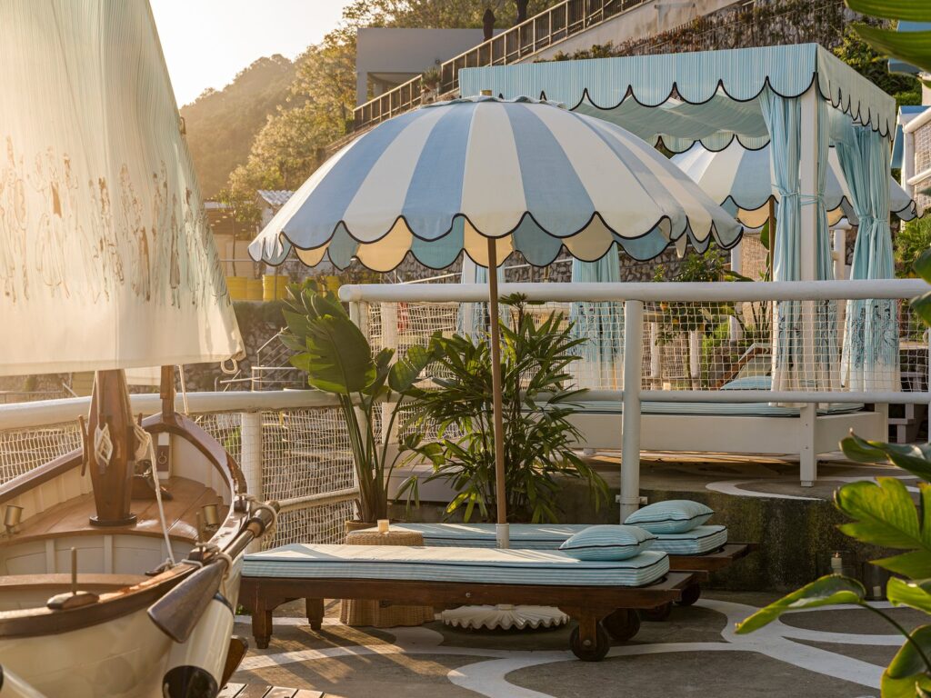 Europe’s Chicest Hotel Pop-Ups Are Stretching Summer Into September A stylish European hotel terrace dressed for a luxury fashion pop-up in late summer