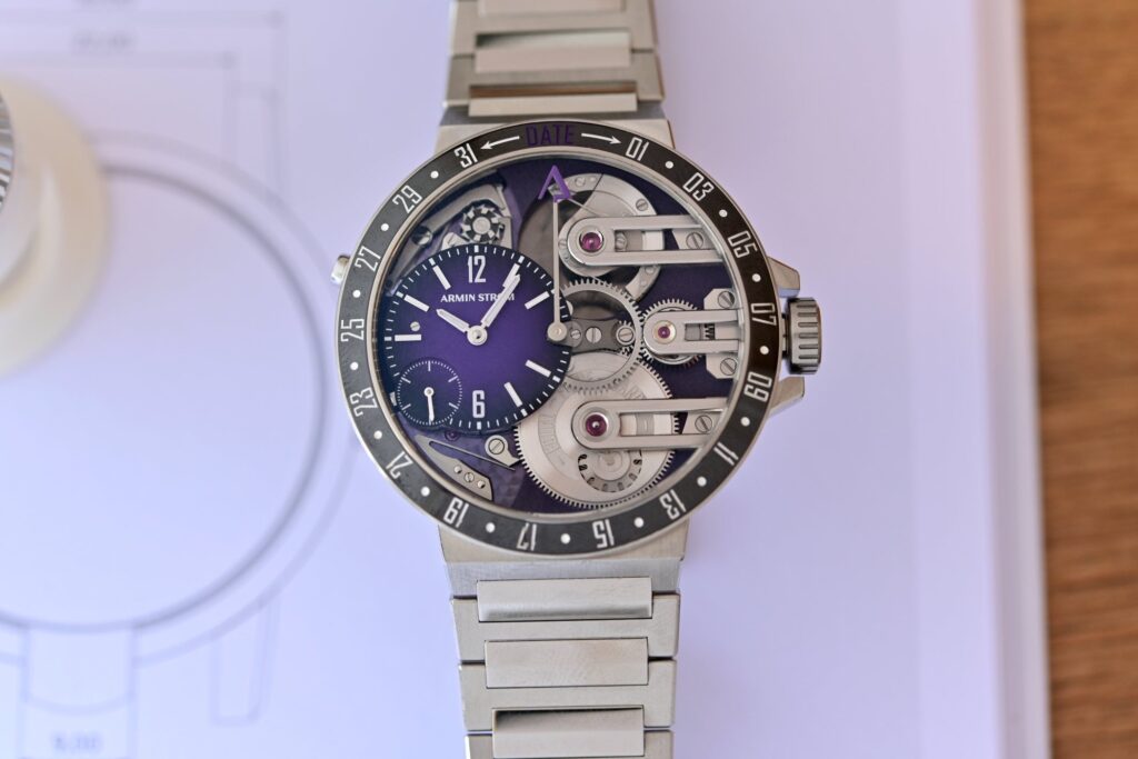 Armin Strom’s Orbit Midnight Purple Turns the Date Into Theatre Armin Strom Orbit Midnight Purple with purple dial-side movement and black ceramic date bezel