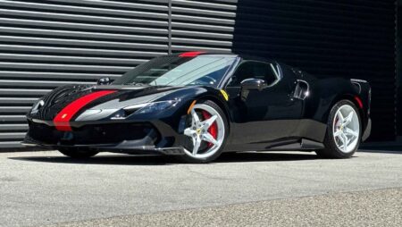 Ferrari 296 Speciale Makes an Early US Resale Debut at $1.9 Million Glossy black Ferrari 296 Speciale with red pinstripe and white wheels