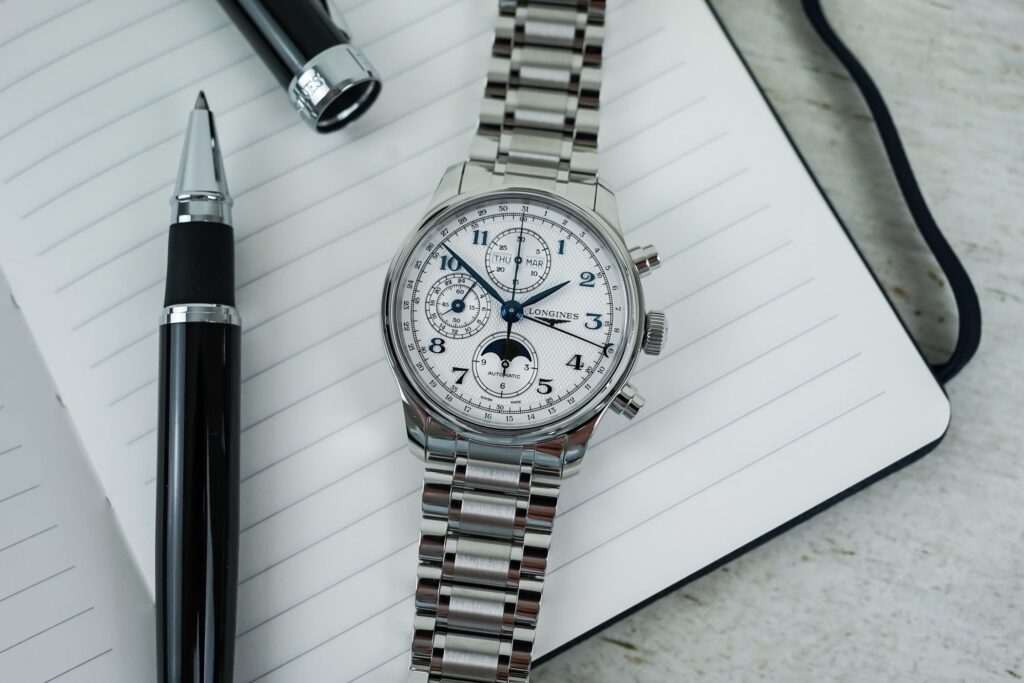 Longines Master Chronograph Moonphase 2026 with silvery-white dial and blue numerals