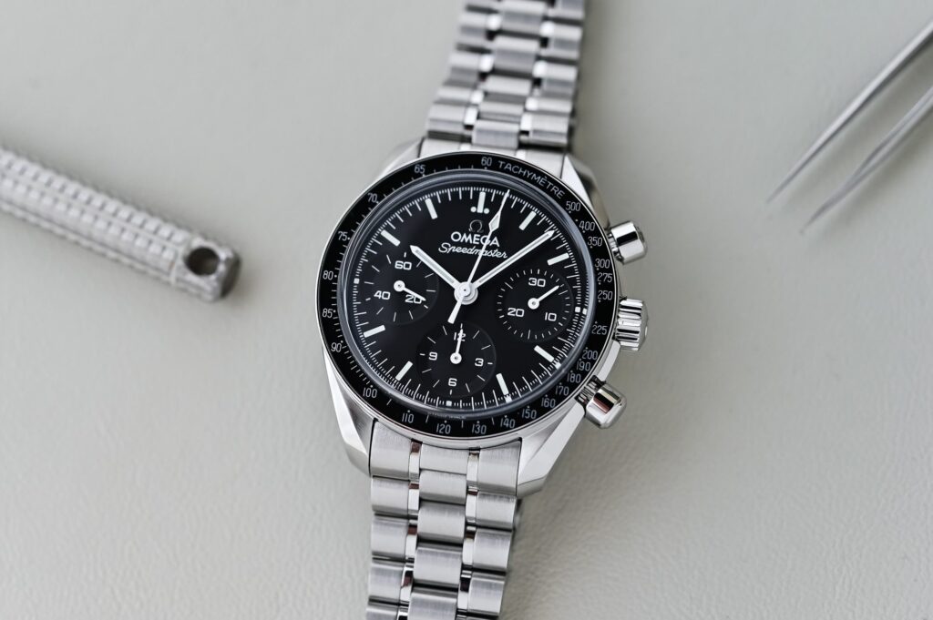 Omega Brings the Speedmaster 38mm Closer to the Moonwatch Omega Speedmaster 38mm black dial steel chronograph on bracelet