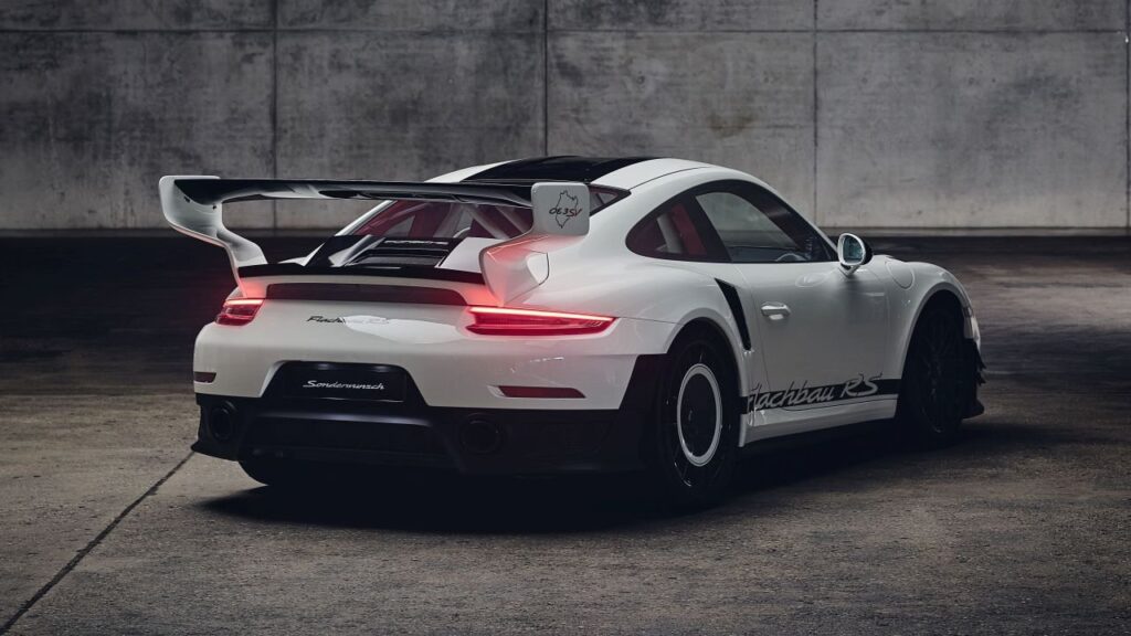 Porsche sports car undergoing bespoke Sonderwunsch design work in a modern studio